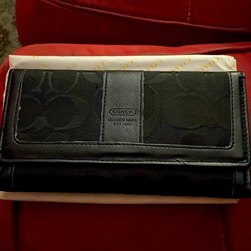 Coach trifold wallet.